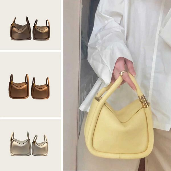 

2023 new thai niche first layer cowhide leather portable one shoulder cross body wonton wonton chaos women's bag 230828