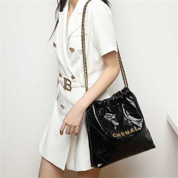 

luxury handbags sale luxury handbag xiangnanma garbage bag autumn and winter new real cowhide chain personalized letter water bucket light l