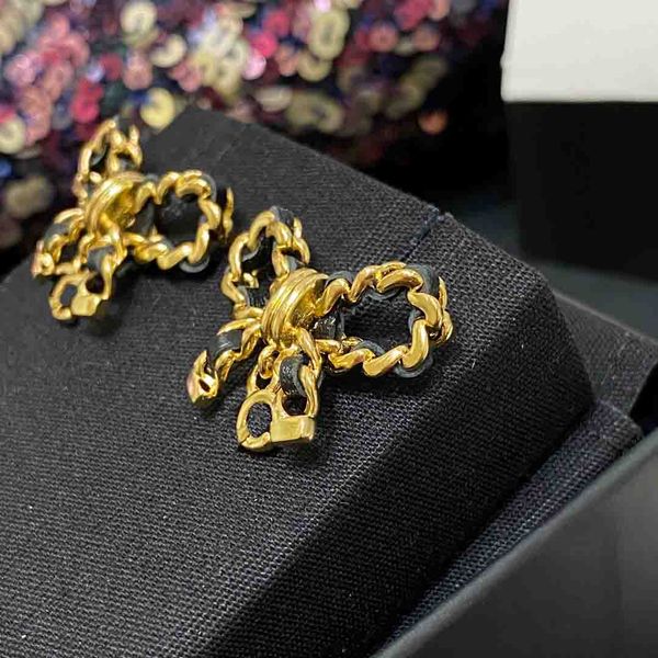 

2023 luxury quality charm drop earring with butterfly shape and black genuine leather in 18k gold plated have box stamp ps7288a, Golden