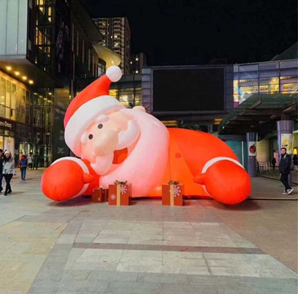 

wholesale 10mh 33ft factory price santa claus led lighted inflatable christmas santas and present with gift bag to door included blower