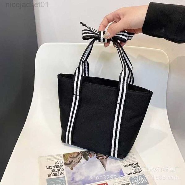 

designer channel women bag new bento bag shopping bag bow tie handbag armpit bag colorful strip medieval style carrying sail bag