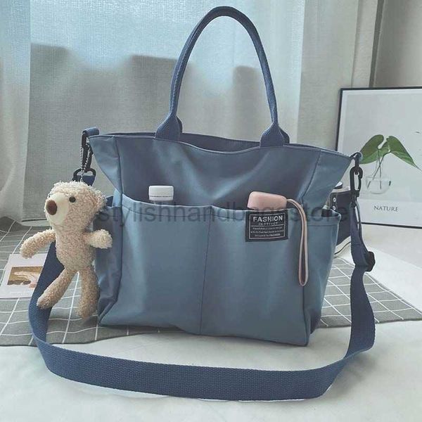 

totes large capacity women's waterproof canvas bag women's messenger bag korean leisure college student class handbagstylishhandba