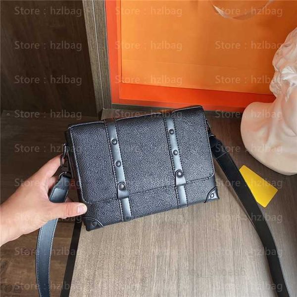 

trunk messenger small rectangular bag black leather embossed magnetic flap closure system mens designer bags