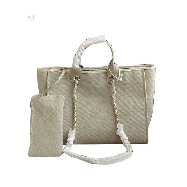 

2022ss deauville clutch with chain beach bags canvas large capacity handle totes embroidery letter simple casual france womens designer hand