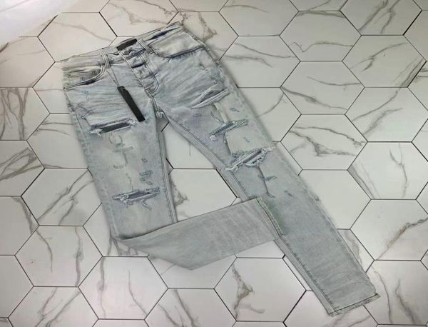 

522021 fashion wash light blue big hole jeans micro elastic slim high street man5673427