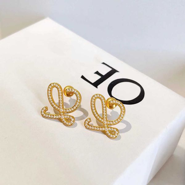 

earrings designer loewees rowe's matching knot pattern pearl for women's fashion and high sense hollow out for women, Golden;silver