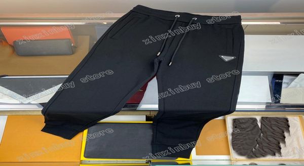 

21ss men jeans pants designer triangle label letter paris letters jogging pant casual slim fit whole body trousers wedding xinxin9042710, Black