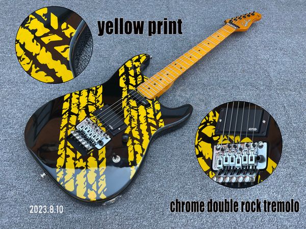 

electric guitar solid body black color with yellow print graphic yellowish color fingerboard and neck chrome parts double rock tremolo sh pi