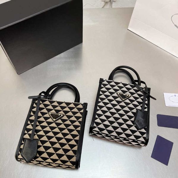 

2023 luxury new embroidered canvas mini tote piano spectrum symbol hand carrying single shoulder messenger femalehigh