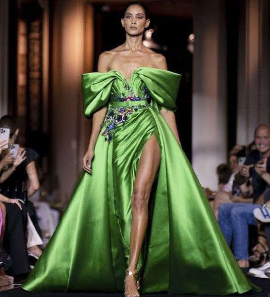 

wearing a green single-slit high-waisted evening dress with colored sequins at the latest launch of zuhair murad brand in 2023., Black;pink