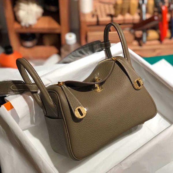 

luxury h ermes tote bags lind luxurys handbag 2023 new leather women layer cowhide gold button doctor ingle houlder portable medicine with r