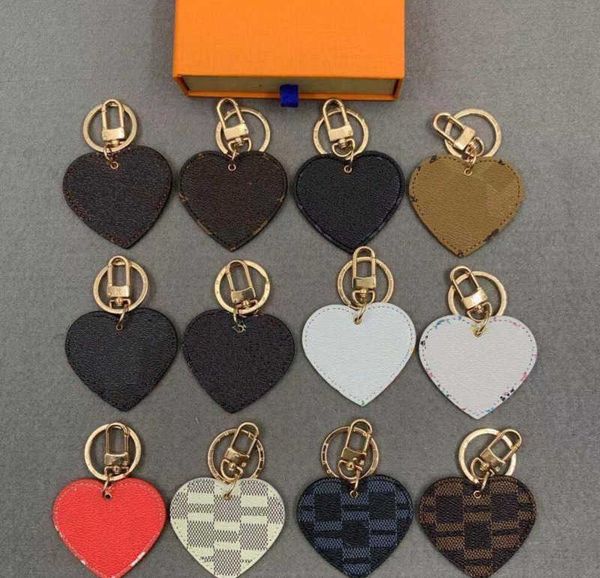 

key chain lanyards brand classic luxurys keychain heart shape brand brown black flower grid designer car keyring womens fibbia keychains han, Silver