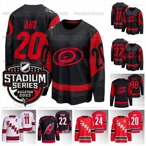 

carolina 2023 stadium series hurricanes jersey andrei svechnikov sebastian aho seth martin necas jarvis skjei staal pyotr kochetkov jaccob s, Black;red