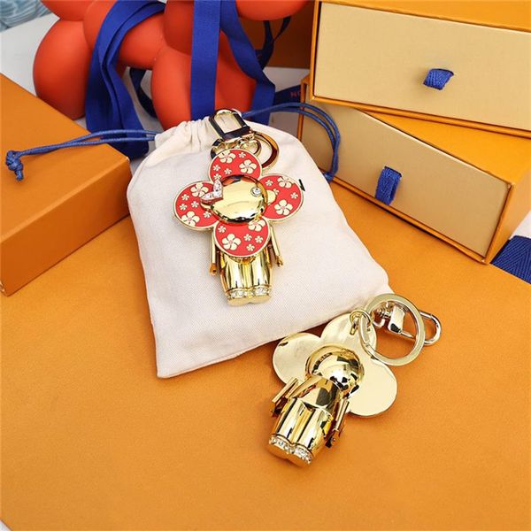 

fashion keychain luxury designer stylish sun-flower doll pendant keychains three colors keys buckle mens womens keys ornaments hig297u, Silver