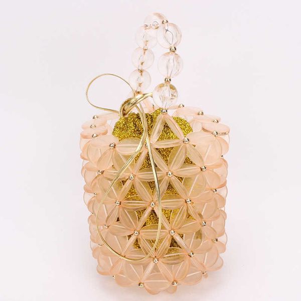 

outsourced overseas high-end handbag barrel portable gold inner bag leather rope shrink pocket manual 230304