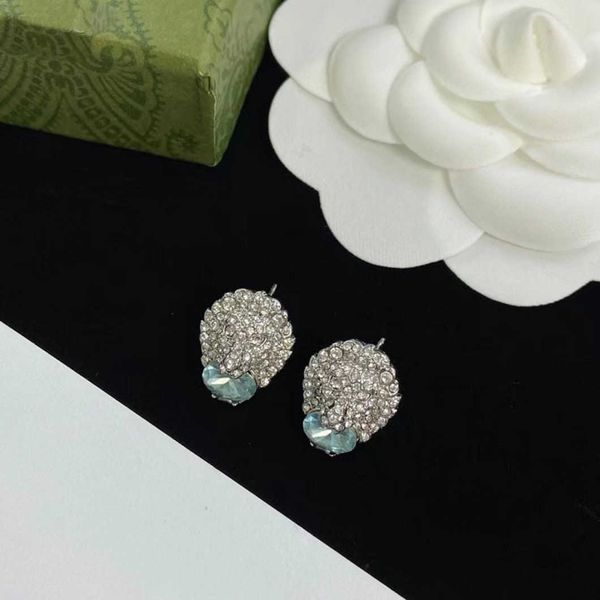 

factory direct sales 2023 new luxury fashion jewelry for 2023 lion hum head rhinestone with sea blue egg-shaped stone brass earrings, Golden