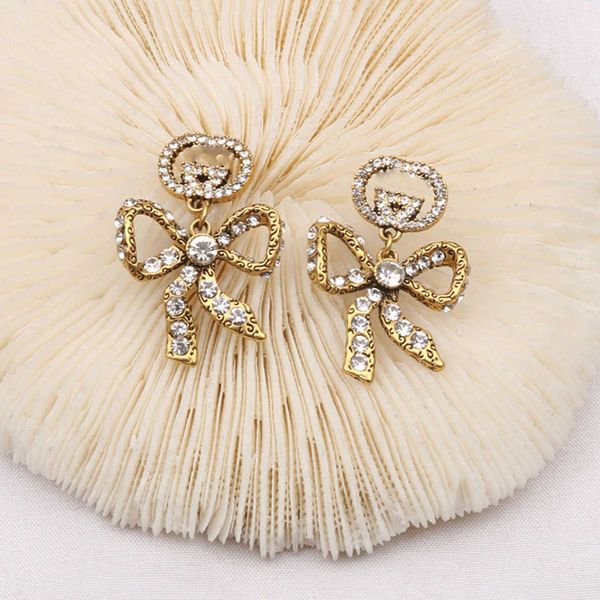 

factory wholesale 2023 new luxury fashion jewelry for bow personalized earrings design double interlocking classic matching earrings, Golden