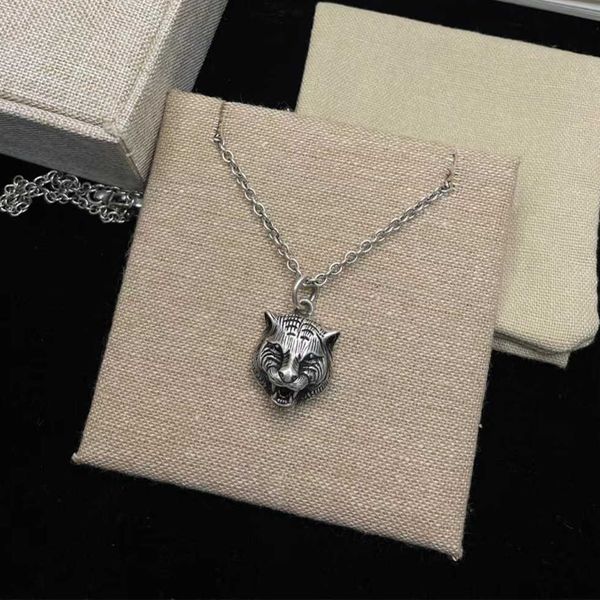 

high-quality luxury jewelry silver embossed head necklace sweater chain men and women ins simple couple