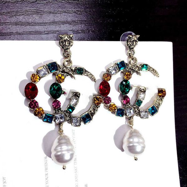 

factory direct sales 2023 new luxury fashion jewelry for colorful crystal exaggerated irregular pearl personalized earrings show face thin e, Golden