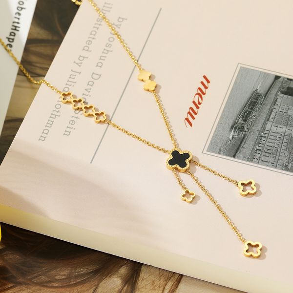 

Four flowers titanium steel necklace women's long style openwork tassel flower pendant fashion personality versatile collarbone chain wholesale
