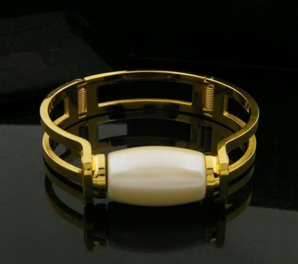 

oval shell beads spring bangle bracelet stainless steel gold color jewelry for men and women2177407, Black