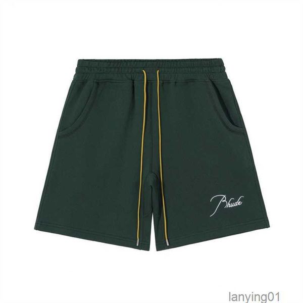 

terry short premium with rh signature script embroidered on the front featuring twin side pockets custom rhude chevron back pocket, White;black