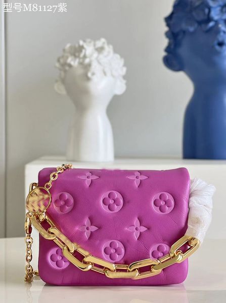 

purple mini chain bag series is part of the 2023 cruise line series. it is made of very soft sheepskin. the thinnest chain is worn on the sh