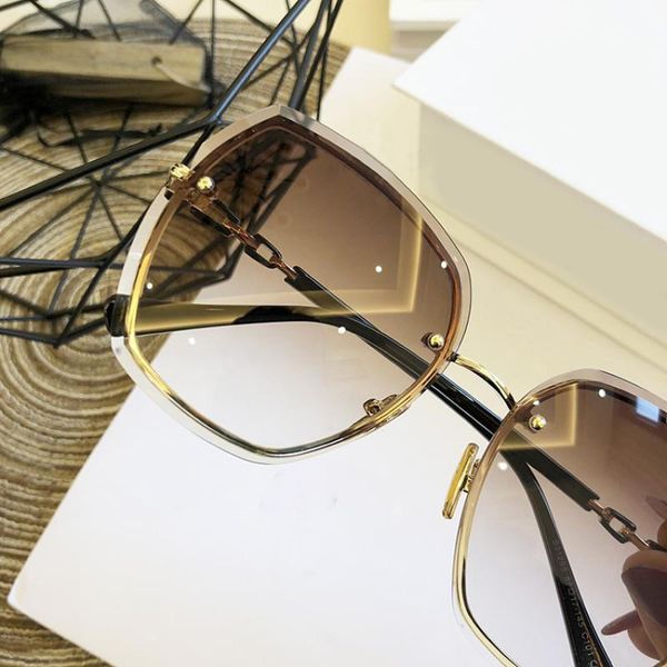 

niche design cut edge rimless glasses sunglasses women's 2023 fashion round glasses uv400 protective lenses, White;black