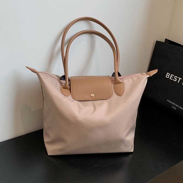 

dinner bag korean versatile large capacity bag 2022 autumn and winter new women's leisure commuting single-shoulder portable longxiang
