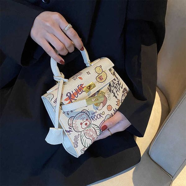 

h bag designer original graffiti kel1ys bag mini second generation cartoon cute 2023 xinke advanced sense single shoulder messenger bag wome