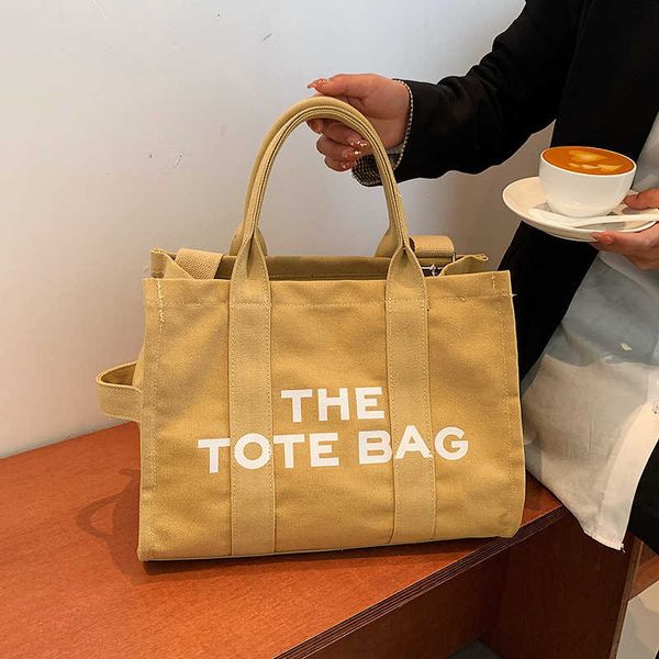 

dinner bag 2022 new canvas letter printing large capacity hand striped decoration single shoulder messenger women's