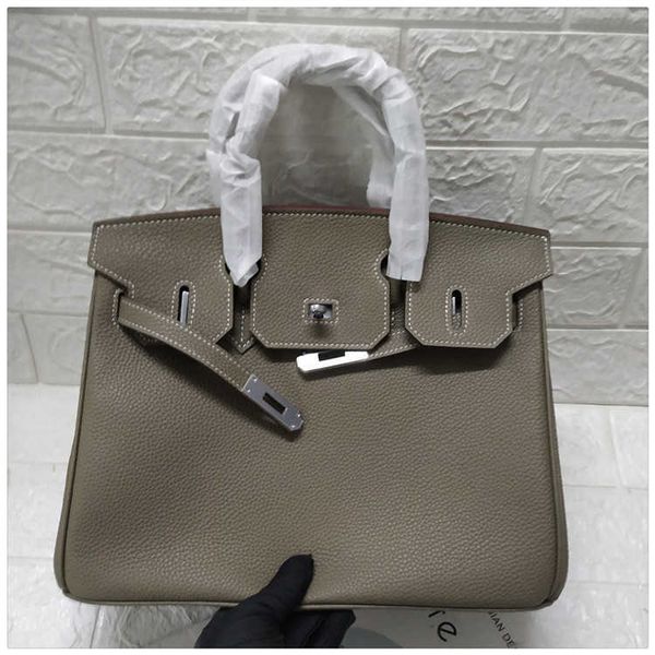 

evening bags h ermes brikis's for women 2023 milk shake white bag togo calf leather head layer large handheld lock mouth women's w