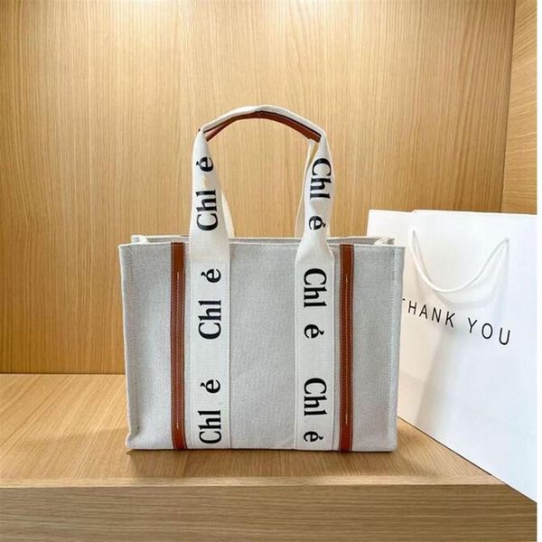 

qwqe 2022 shoulder bag letter print stripe evening bags large capacity tote canvas female japanese casual handbag shopping bags184h
