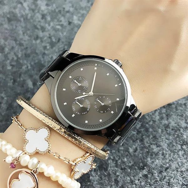 

fashion brand wrist watch for women girl th flag style steel metal band quartz watches tom 09277b, Slivery;brown