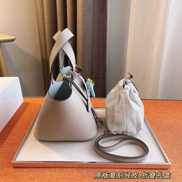

designer original herms 2023 new h family head leather portable litchi pattern vegetable basket bag women's bucket bag