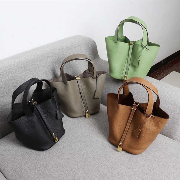 

designer original herms 2023 new h home layer cowhide litchi golden clad vegetable basket bag women's handheld bucket one shoulder chil