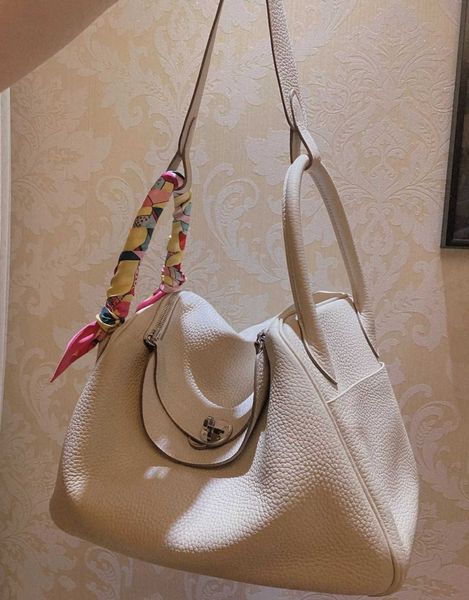 

designer original luxury 2023 bags new leather women's bag layer cowhide lindys gold button doctor single shoulder portable medicine 2