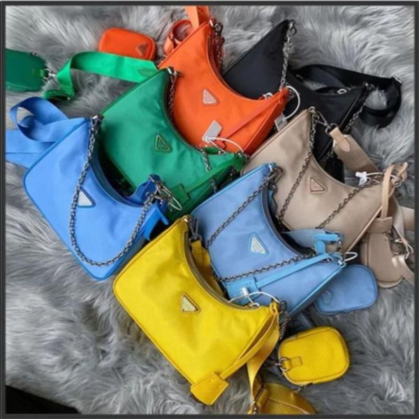 

totes 2023 fashion re-edition 2005 nylon woman luxurys men designers bags lady womens mens crossbody tote hobo shoulder purses handbags npxv
