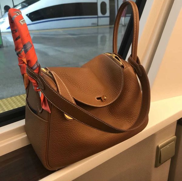 

designer original luxury 2023 bags new leather women's bag layer cowhide lindys gold button doctor single shoulder portable medicine ym