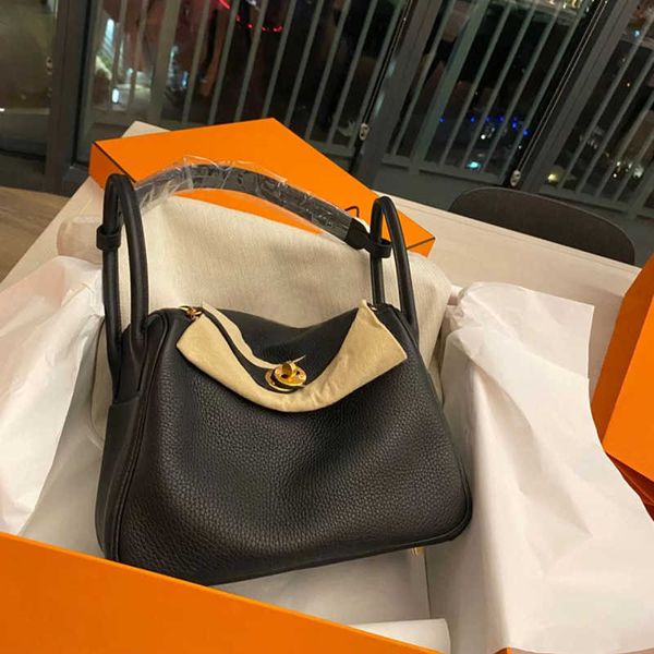 

luxury bags original designer 2023 new leather women's bag layer cowhide lindys gold button doctor single shoulder portable medicine ha