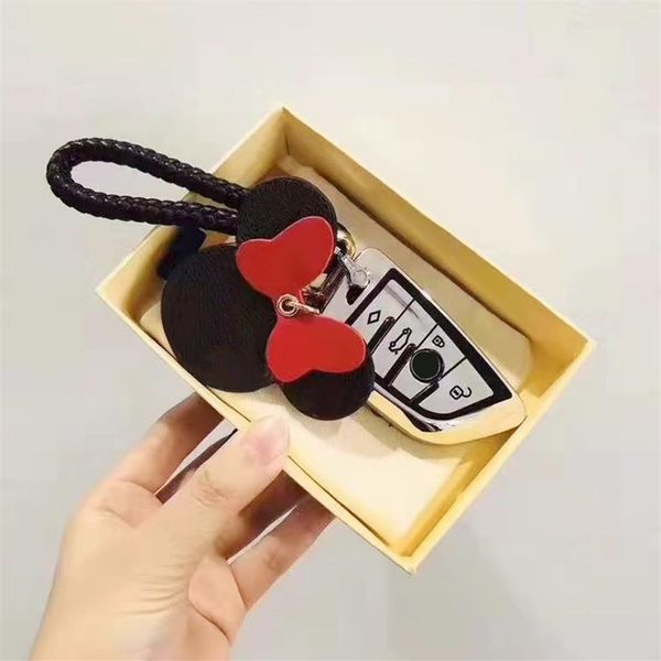 

2021 keychain key chain buckle keychains lovers car handmade leather men women bags pendant accessories 5 color 65221 with box dus289s, Silver