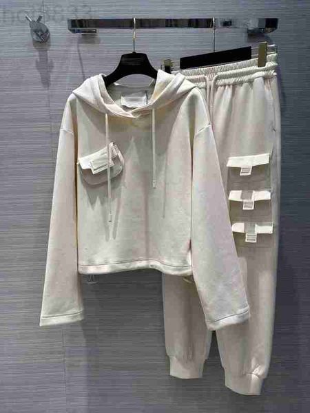 

women's two piece pants designer 2023 new spring summer hooded long sleeve brand same style 2 sets coat e5kg, White
