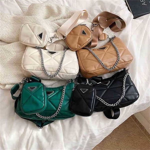 

handbag 2023 fashion women's bag leather quality handbag solid color triangle sewing trend child mother simple shoulder messenger chain