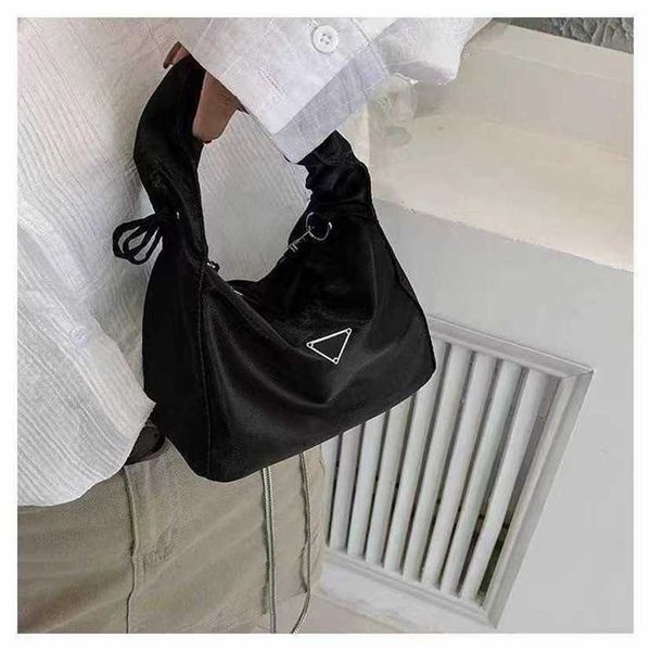 

handbag 2023 fashion women's bag leather quality handbag fashionable shoulder nylon cloth triangle label basket small cool black chain