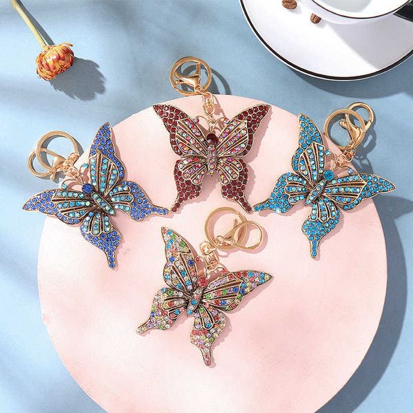 

key rings new color crystal hollow butterfly metal european and american keychain pendant creative small gift bag pendant r230311, Slivery;golden
