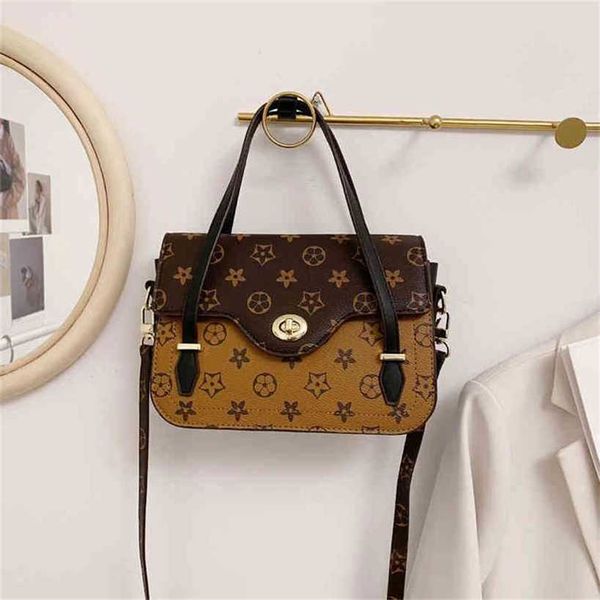 

handbag 2023 fashion women's bag leather quality handbag female spring shoulder messenger hand-held street trend style personality bag