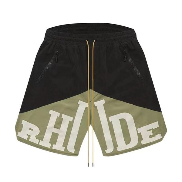 

rhude shorts designers mens basketball short pants 2021 luxurys summer beach palm letter mesh street fashion sweatpants 1 0j9s, White;black
