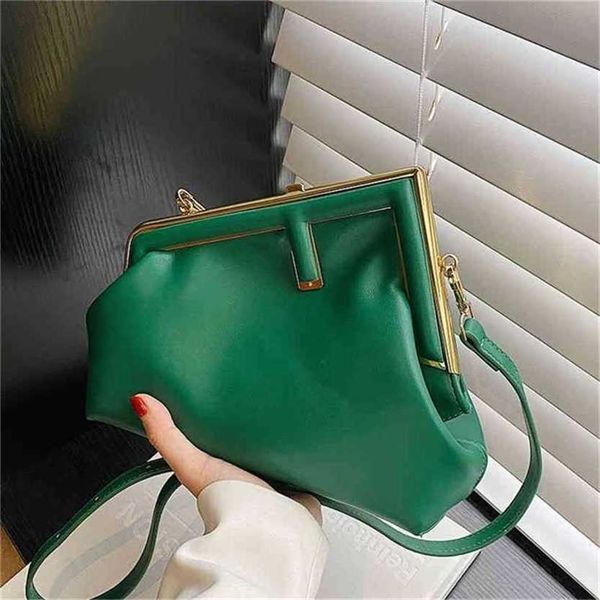 

handbag 2023 fashion women's bag leather quality handbag this year's popular temperament is fashionable, personalized style tide v