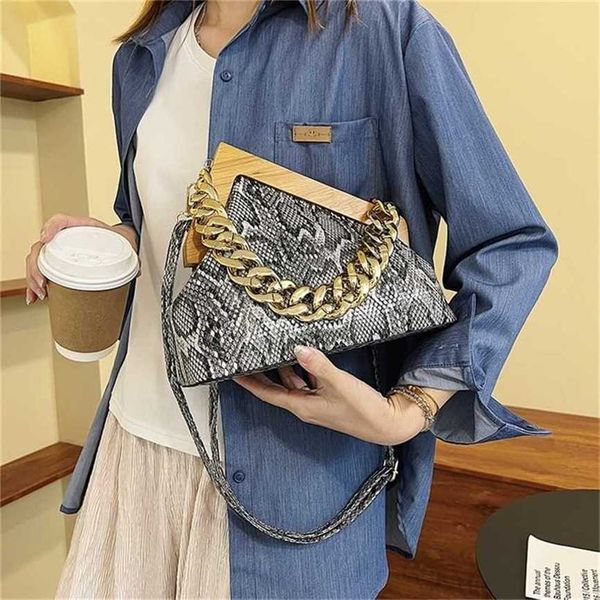 

handbag 2023 fashion women's bag leather quality handbag simple shell shoulder messenger popular clip buckle women's bag