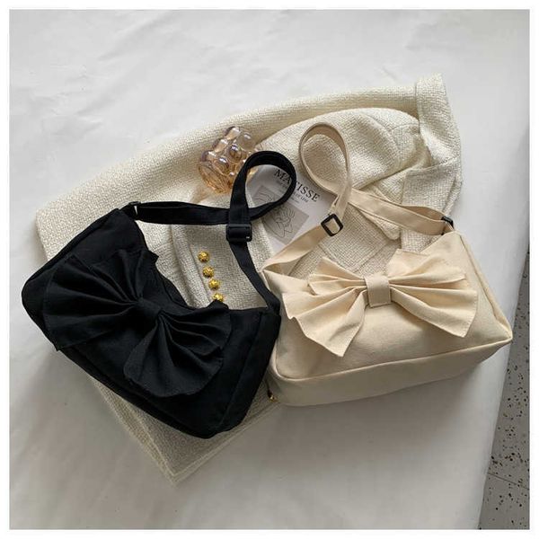 

bow knot messenger bags for women canvas shoulder bags new large capacity bags female solid color casual zipper bags 230308